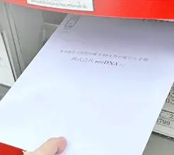 Drop the sample collection kit into the post with the return envelope